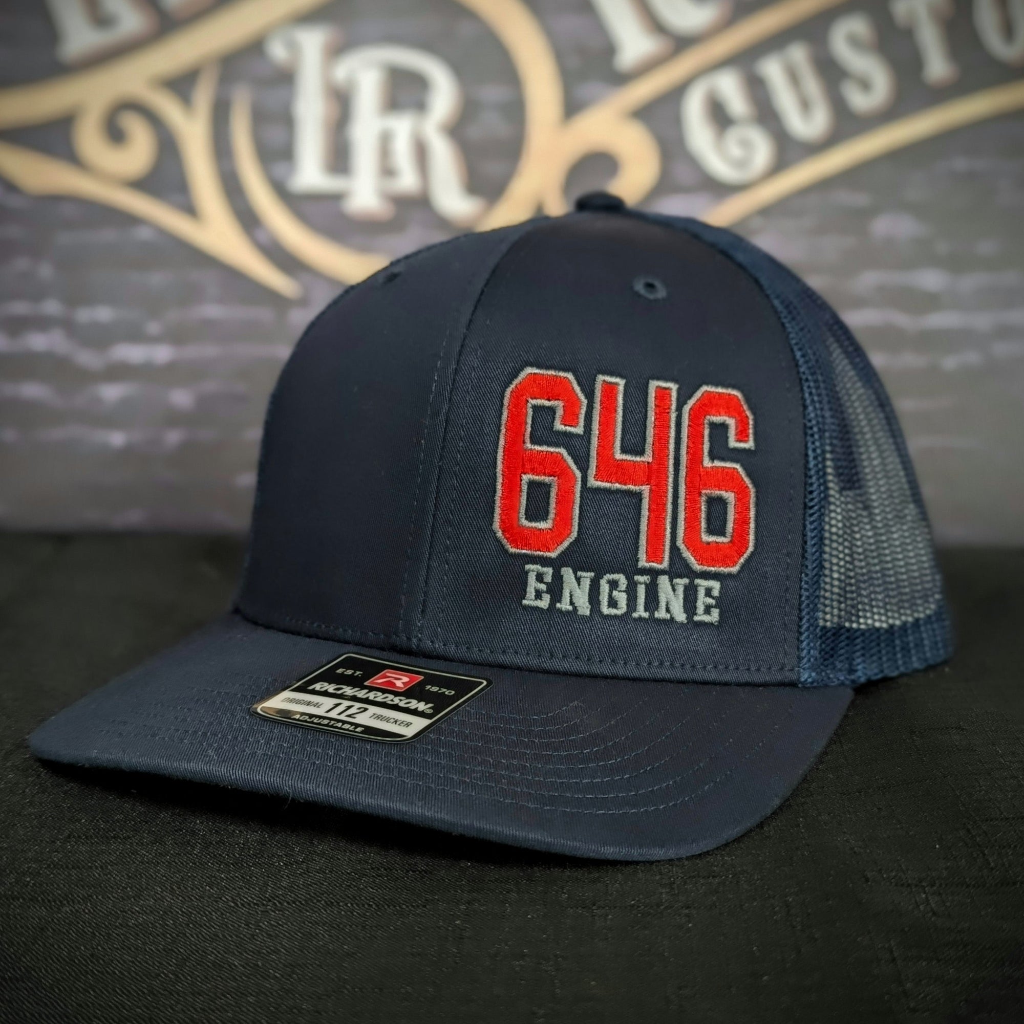 Custom embroidered firefighter hat with bold stitching, structured fit, and premium Richardson snapback design
