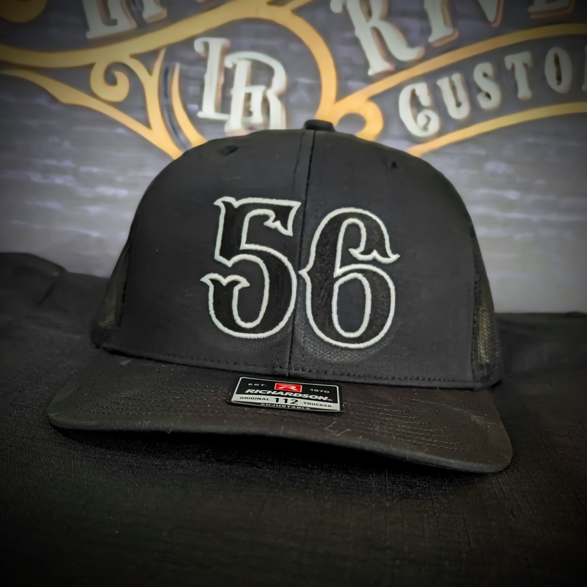 Custom embroidered firefighter hat with bold stitching, structured fit, and premium Richardson snapback design