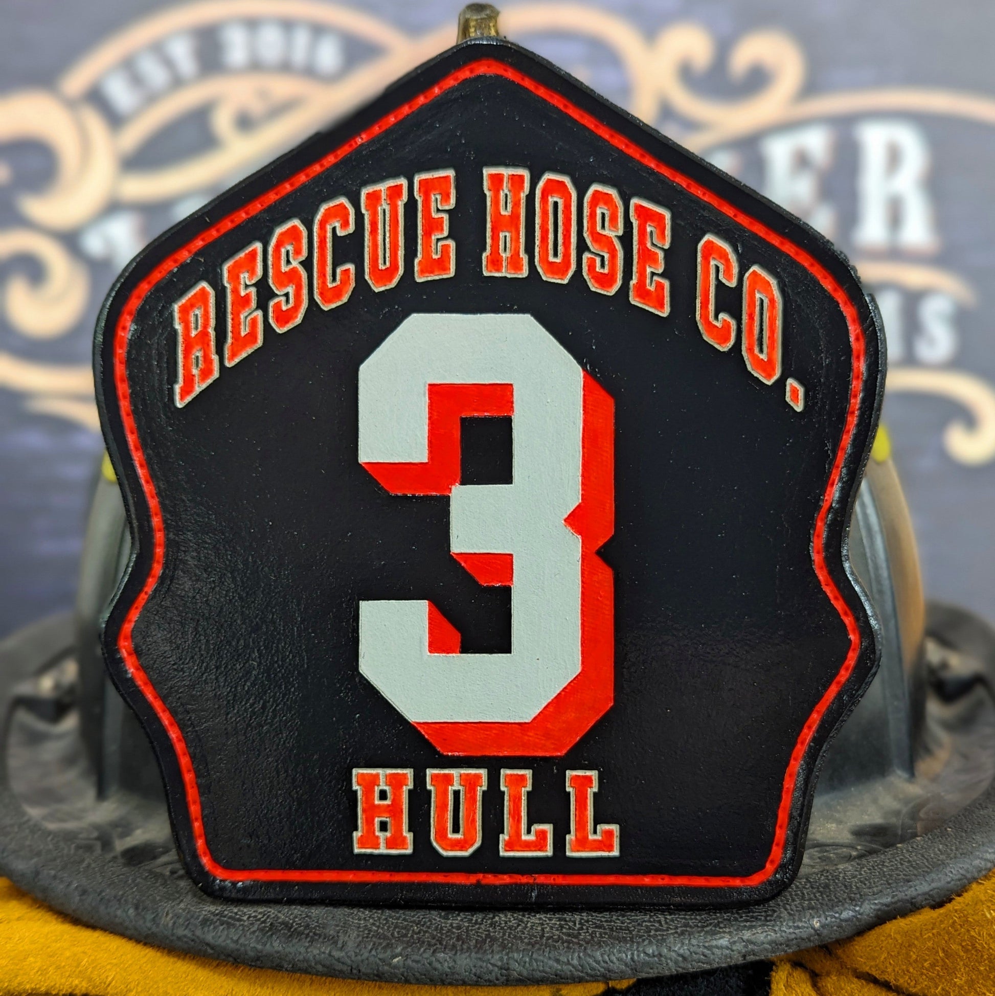 firefighter helmet front – old-school leather with modern pride