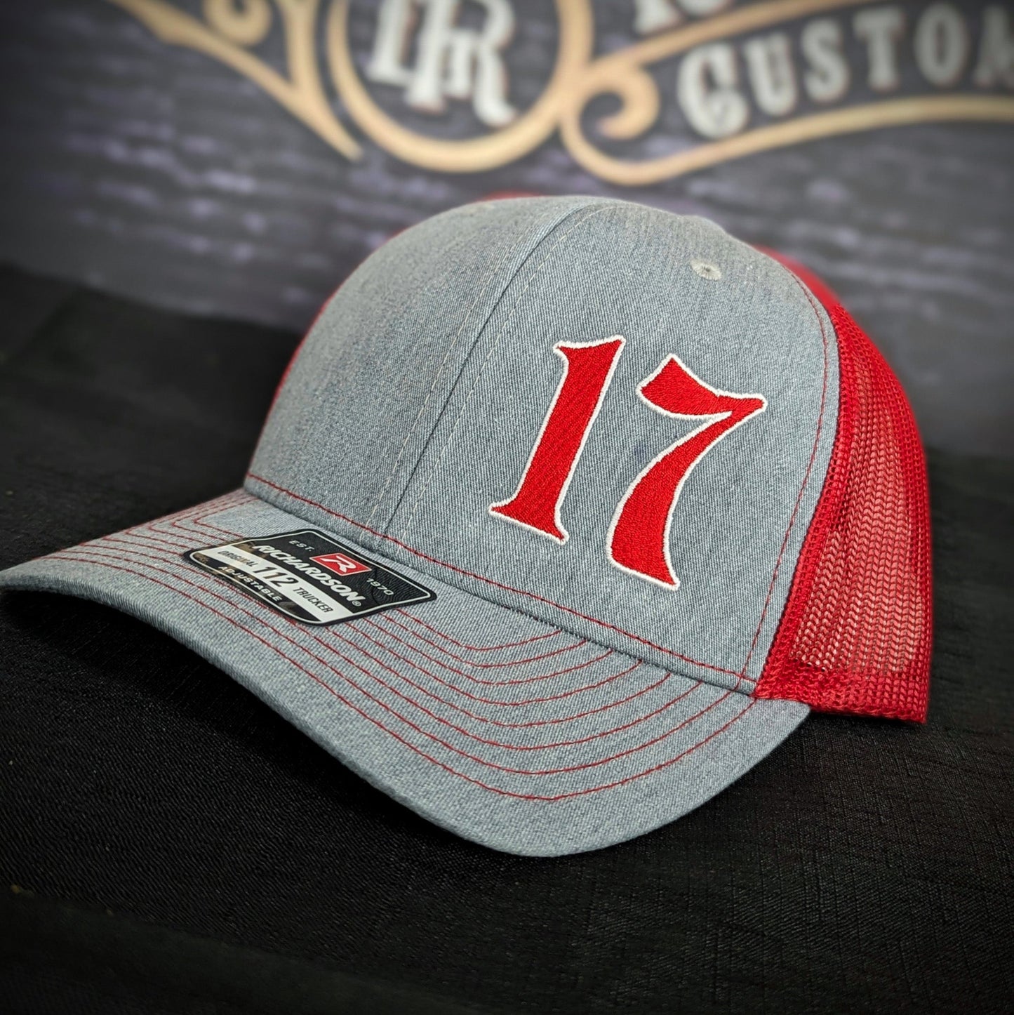 Custom embroidered firefighter hat with bold stitching, structured fit, and premium Richardson snapback design