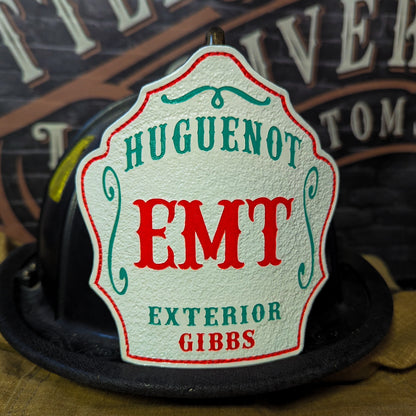 Custom Leather fire helmet shield with department name, rank, and company number