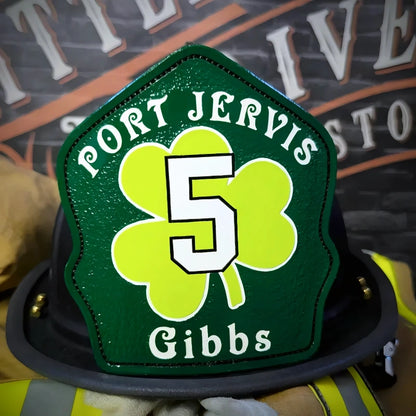 Handmade leather helmet shield showing shamrock and rockers