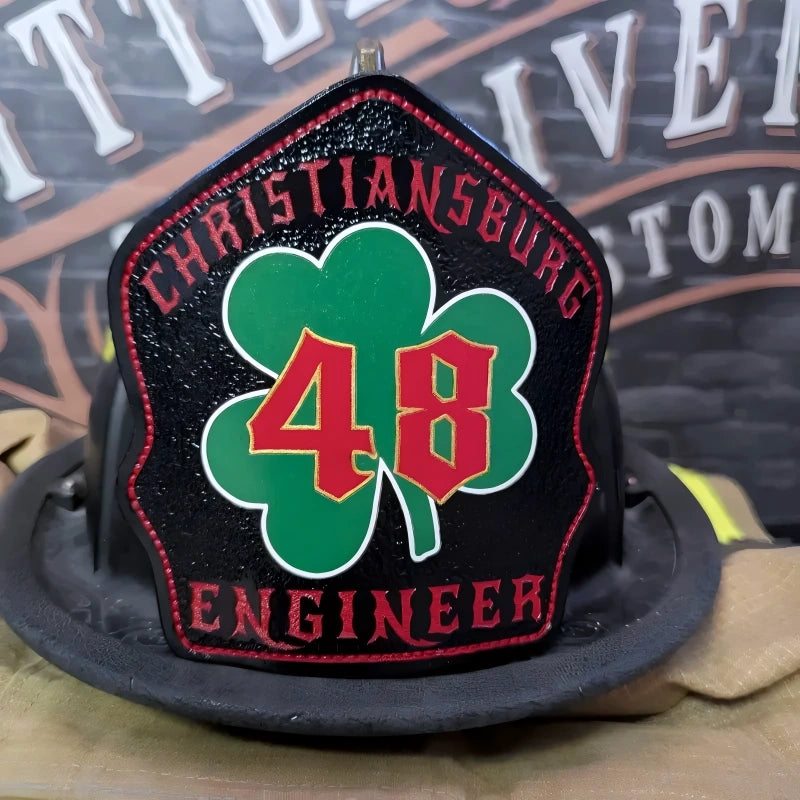Classic firefighter helmet shield with Irish shamrock