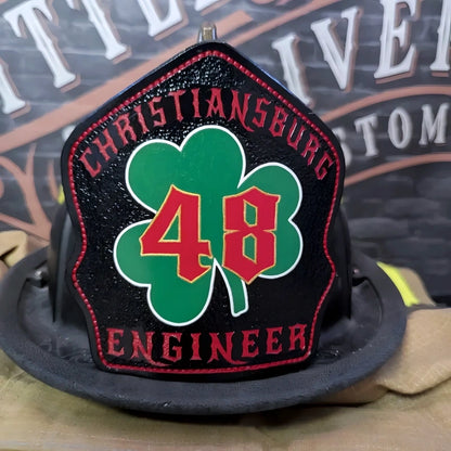 Classic firefighter helmet shield with Irish shamrock