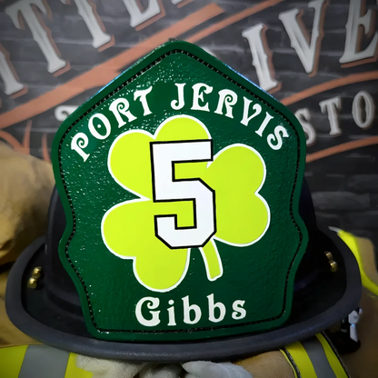 Leather firefighter helmet shield showing shamrock format for department identity