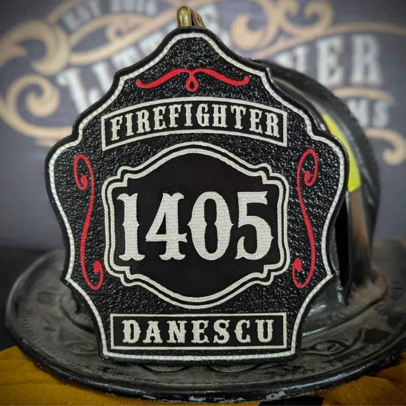 Standard Issue custom leather firefighter helmet shield in black with white numbers, red trim accents, and firefighter rank text.