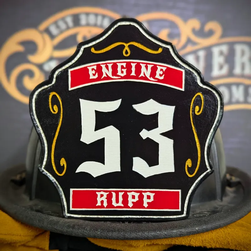 Standard Issue custom leather firefighter helmet shield for Engine company in black with white numbers and red panels.