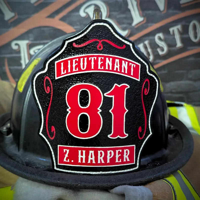 Standard Issue custom leather firefighter helmet shield for Lieutenant in black with red numbers and white trim.