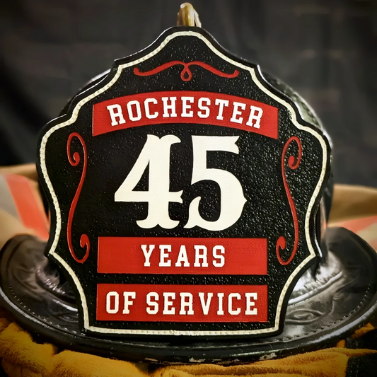 Custom leather firefighter helmet shield in three rocker style built for fire service pride