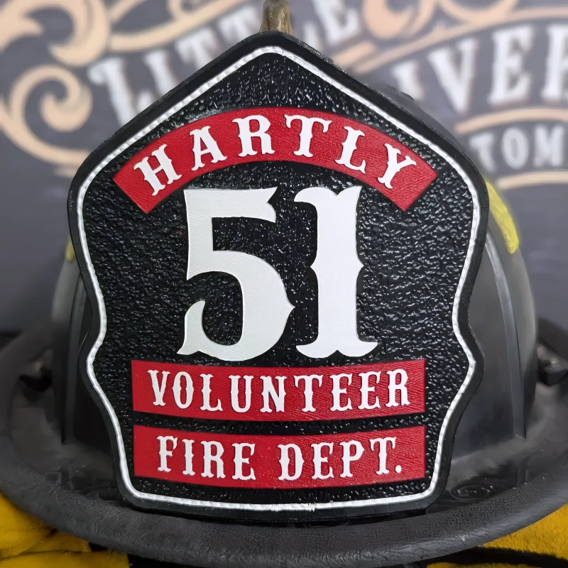 Firefighter helmet shield crafted from leather featuring classic three rocker shield layout