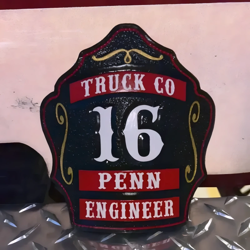 Traditional leather firefighter helmet shield featuring three rocker design for visibility